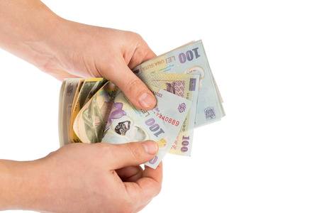 Man hands counting romanian money leiの写真素材