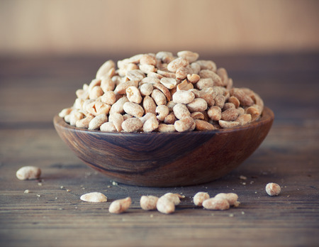 Bowl of salted  peanutsの写真素材