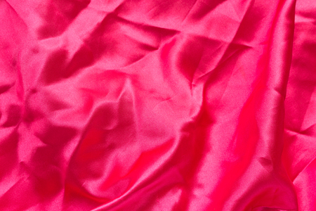 Red fabric texture backgroundの写真素材