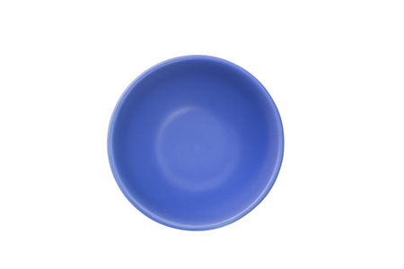 Blue plate isolated on white background.の写真素材