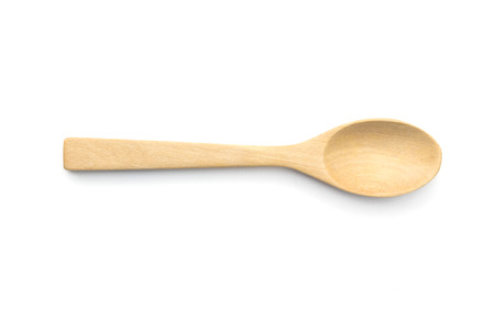 wooden spoon isolated on white background.の写真素材