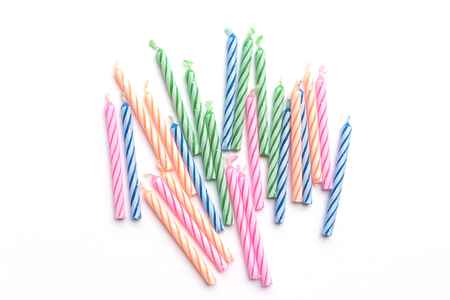 Set of colored birthday candles isolated on white background.の写真素材