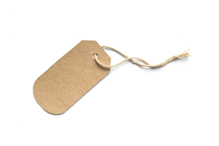 Blank brown cardboard price tag or label with thread isolated white background.の写真素材