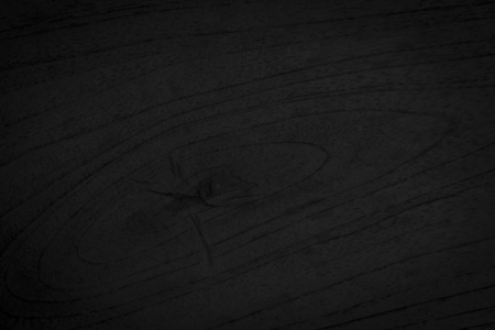 Wooden texture on black background.の写真素材