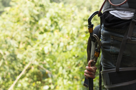 climbing , zipline equipment in blur background.professional climbing gear