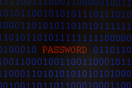 hacker with digital tablet stealing data