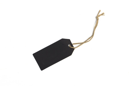 Blank black cardboard price tag or label with thread isolated white background.