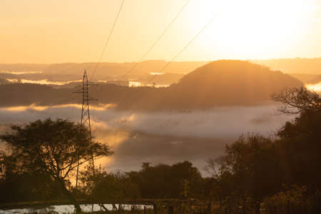 Sunrise in the region of Jaguari River Valley, Jaguari City, RS, Brazil. Jaguari is a word of Tupi-Guarani origin and means river of the Jaguar. Tourism in the central region of the state of RSの写真素材
