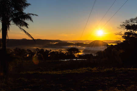 Sunrise in the region of Jaguari River Valley, Jaguari City, RS, Brazil. Jaguari is a word of Tupi-Guarani origin and means river of the Jaguar. Tourism in the central region of the state of RSの写真素材
