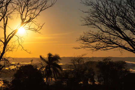 Sunrise in the region of Jaguari River Valley, Jaguari City, RS, Brazil. Jaguari is a word of Tupi-Guarani origin and means river of the Jaguar. Tourism in the central region of the state of RSの写真素材