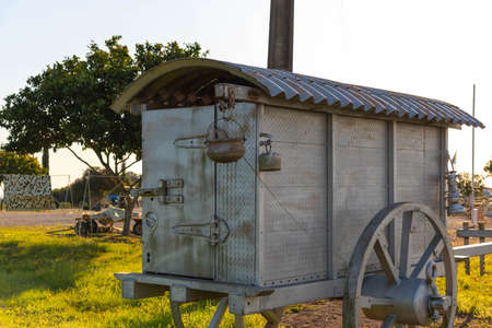 Old horse-driven wagon that today serves as crafts. Ancient object that served as a means of transport and cargo. Decoration object.の写真素材