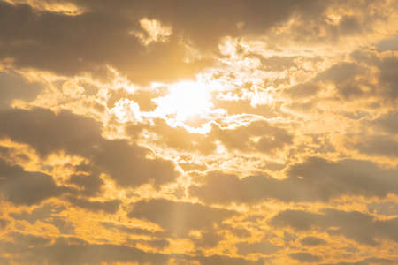 A late autumn afternoon in the south of Brazil, with the presence of clouds and the colors and contrasts of the shadows with the intense orange of the west Sun. Landscape at dusk of an autumn and cold day.の写真素材