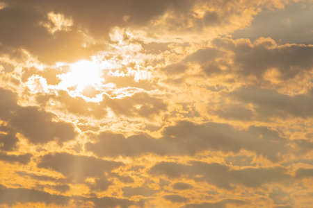 A late autumn afternoon in the south of Brazil, with the presence of clouds and the colors and contrasts of the shadows with the intense orange of the west Sun. Landscape at dusk of an autumn and cold day.の写真素材