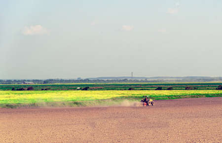 Brazilian rural landscape. Rice planting area (Oryza ssp.). Soil in preparation for the sowing of the summer period. Agriculture and agribusiness. Agricultural production farm.の写真素材