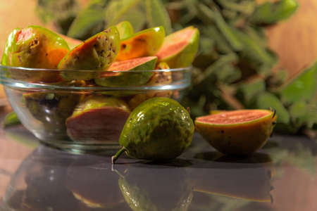 Guava fruits in halves. Guava is the fruit of guava, a tree of the Psidium guajava species, of the Myrtaceae family, originally from tropical America. It occurs mainly in Brazil, in the Antillesの写真素材