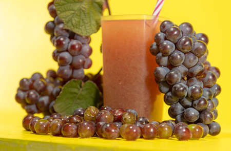 Bunches of pink grape. Fruit juice. Energetic and refreshing drink. Table grape. Niagara Rosada. Description: It is a canopy cultivar of Vitis labrusca.の写真素材