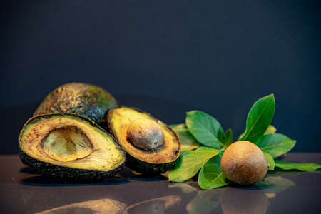 Fresh avocado fruit, also known as avocado. Avocado hassle. Its peel has a less smooth texture than other avocados; Avocado is smaller than the other avocado varietiesの写真素材