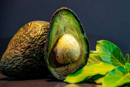 Fresh avocado fruit, also known as avocado. Avocado hassle. Its peel has a less smooth texture than other avocados; Avocado is smaller than the other avocado varietiesの写真素材