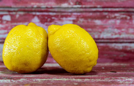 Sicilian lemon is a great source of vitamin C and citric acid, which can increase the absorption of iron from other foods, helping to prevent disease. Ingredient for juices and sweets.の写真素材