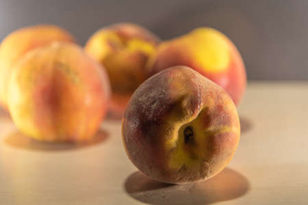 Peach fruit. Fruit that originates in China, where it is considered the tree. Its tree can reach 8 meters in height, presenting serrated leaves and flowers with a purple hueの写真素材