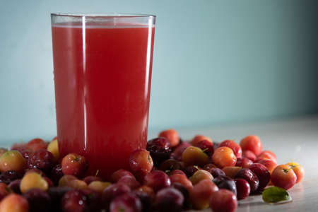 Fresh fruits and juices. Acerola is a fruit rich in vitamin C, widely used in juices and ice cream....