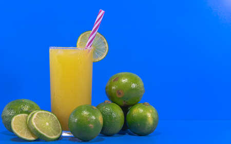 Glass of lemonade. Fresh lemon fruits. Source of vitamin C. Natural and refreshing drink. Drink to quench your thirst. Wonderful drink for people who are suffering from stomach problems.の写真素材