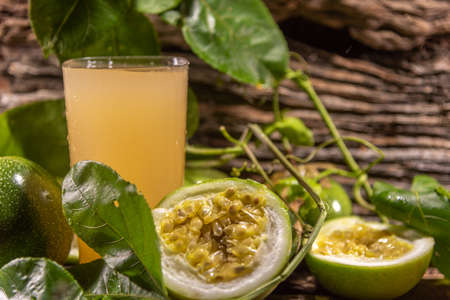 Tropical passion fruit juice. Fruit with essential nutrients for health well-being. Correspondds to...