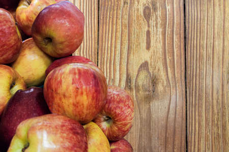 Red apples. Scene background. fruits on wooden background. Background. woody background. Food for...