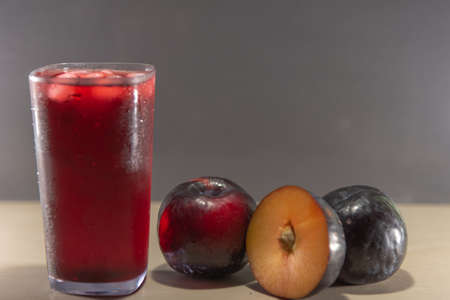 Plum juice and fruits (Prunus Alleghaniensis) is a very well-known and recommended fruit to combat constipation. The juice from the plum can offer protection against liver disease.の写真素材
