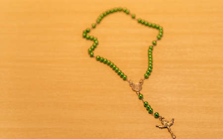 Rosary and religious crucifix. Symbols of Catholicism. Crucifix (Cross of Christ) is a symbol of...