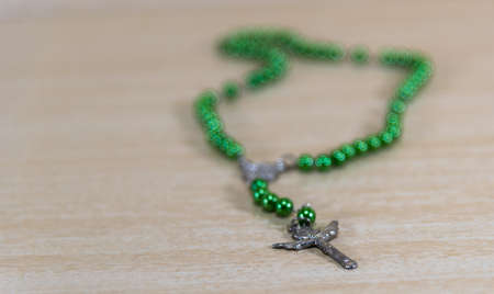 Rosary and religious crucifix. Symbols of Catholicism. Crucifix (Cross of Christ) is a symbol of veneration, which was initiated by Christians during the period after the crucifixion of Jesus Christ.の写真素材