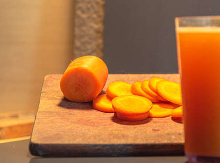 Carrot juice (Daucus carota). Vegetable used for salads. The carrot is the main vegetable in which the edible part is the root. She is originally from Europe and Asia.の写真素材