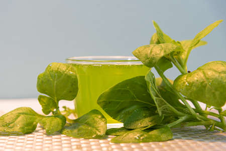Green spinach juice (Spinacia oleracea). Natural drink. Vegan drink. Spinacia oleracea. Spinach is a...