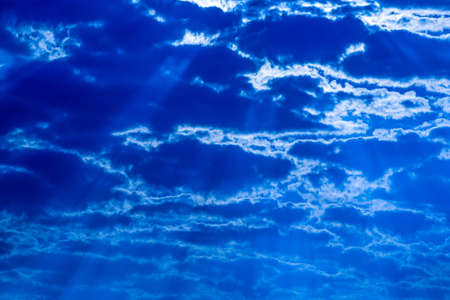 Evening in the region of the Pampa Biome. Late afternoon in southern Brazil. Dramatic sky. Colors and hues. Setting sun and late afternoon. Poetry and magic. Feelings of peace and infinity. Peace and calm. Rural.の写真素材