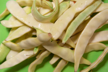 Pod bean vegetable salad. Pods of Phaseolus vulgaris L. .. Fresh food ready for human consumption....