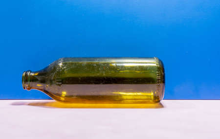 Old glass bottle. Edible oil storage bottle. one and a half olive oil gaffasa. Argentine industry. Crafts bottles. Collection items. Glassware.の写真素材
