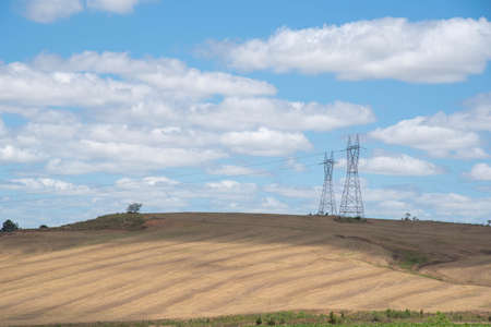 Power transmission towers. Electric transmission infrastructure. technology. Rural landscape....
