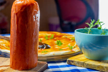 Piece of smoked pork loin used as a pizza making ingredient. Ilanian cuisine. Ingediente for pizza construction. Culinary delicacy. Pork sausage.の写真素材