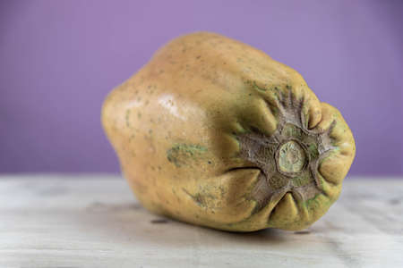 Formosa variety papaya fruit on wooden background. Papaya Formosa. Fruit source rich in nutrients. edible fruit. Ingredient for juices and protein source.の写真素材