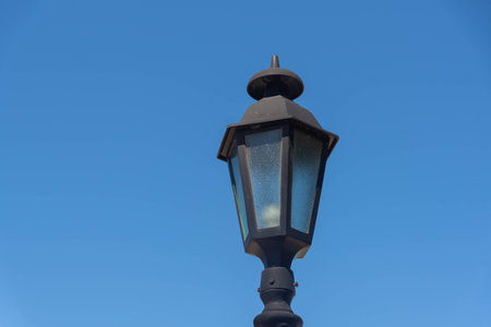 Street lamp on a blue sky background.の写真素材