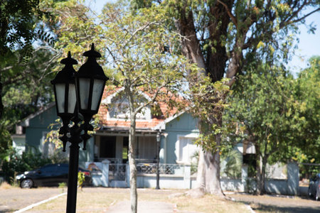 Lantern in front of a house in the tropics.の写真素材