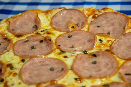 Homemade cheese and loin pizza. Pizza is a dish of Italian origin, but it is famous worldwide. In addition to being famous, this is a food that almost everyone likes.の写真素材