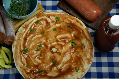 Homemade pizza with cheese and tomato sauce. Typical Italian food. Home cooking and cooking. Traditional food, Pizza with cheese and sauce.の写真素材