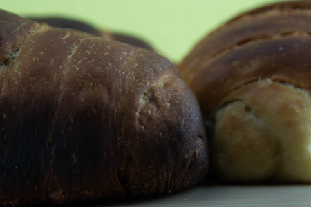 Wheat bread made by hand. Homebread. Common food, made with flour, water, salt and yeast.