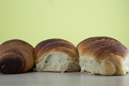 Wheat bread made by hand. Homebread. Common food, made with flour, water, salt and yeast.