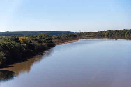 Margins of the Ibicui River in southern Brazil. The IbicuÃ­ River is a Brazilian river located in the state of Rio Grande do Sul. It is a tributary of the Uruguay River.の写真素材