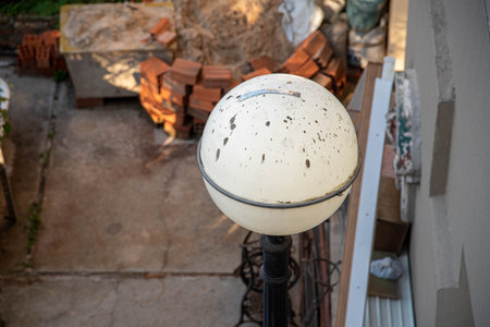 Lighting globe smeared with cement drips. Lighting object. Interior decoration object.の写真素材