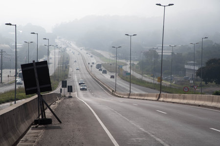 Traffic on an urban road in the city of Santa Maria RS Brazil. urban city. Geographical center of Rio Grande do Sul. university city. Highway. transport infrastructure.の写真素材
