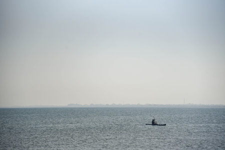 Man kayaking in the sea