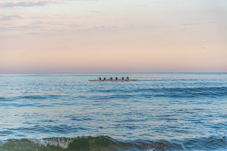 Rowing team on Gamboa beach, Santa Catarina, Brazil
